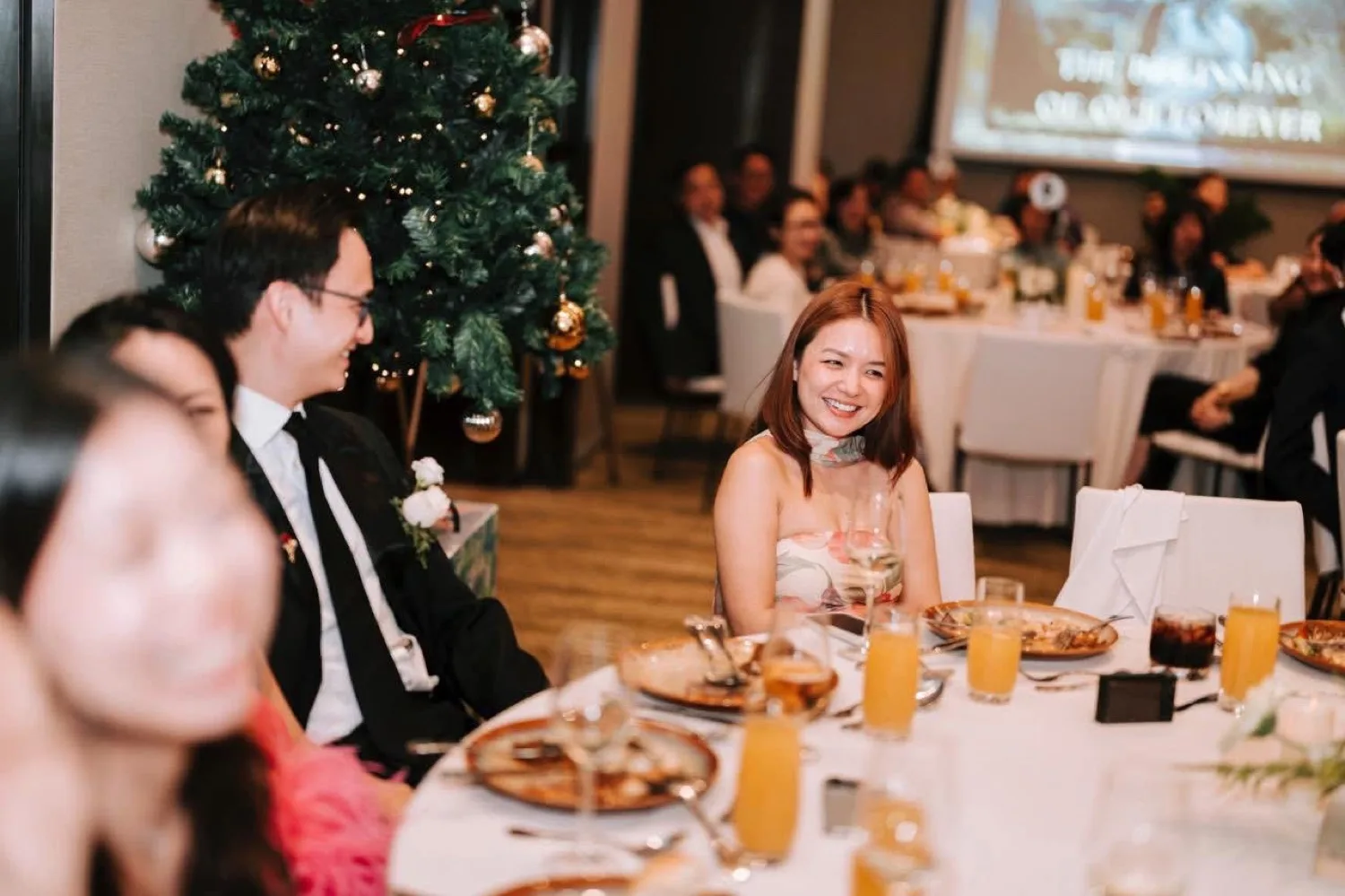 Ian and Phy sharing a table with their community ten years ago